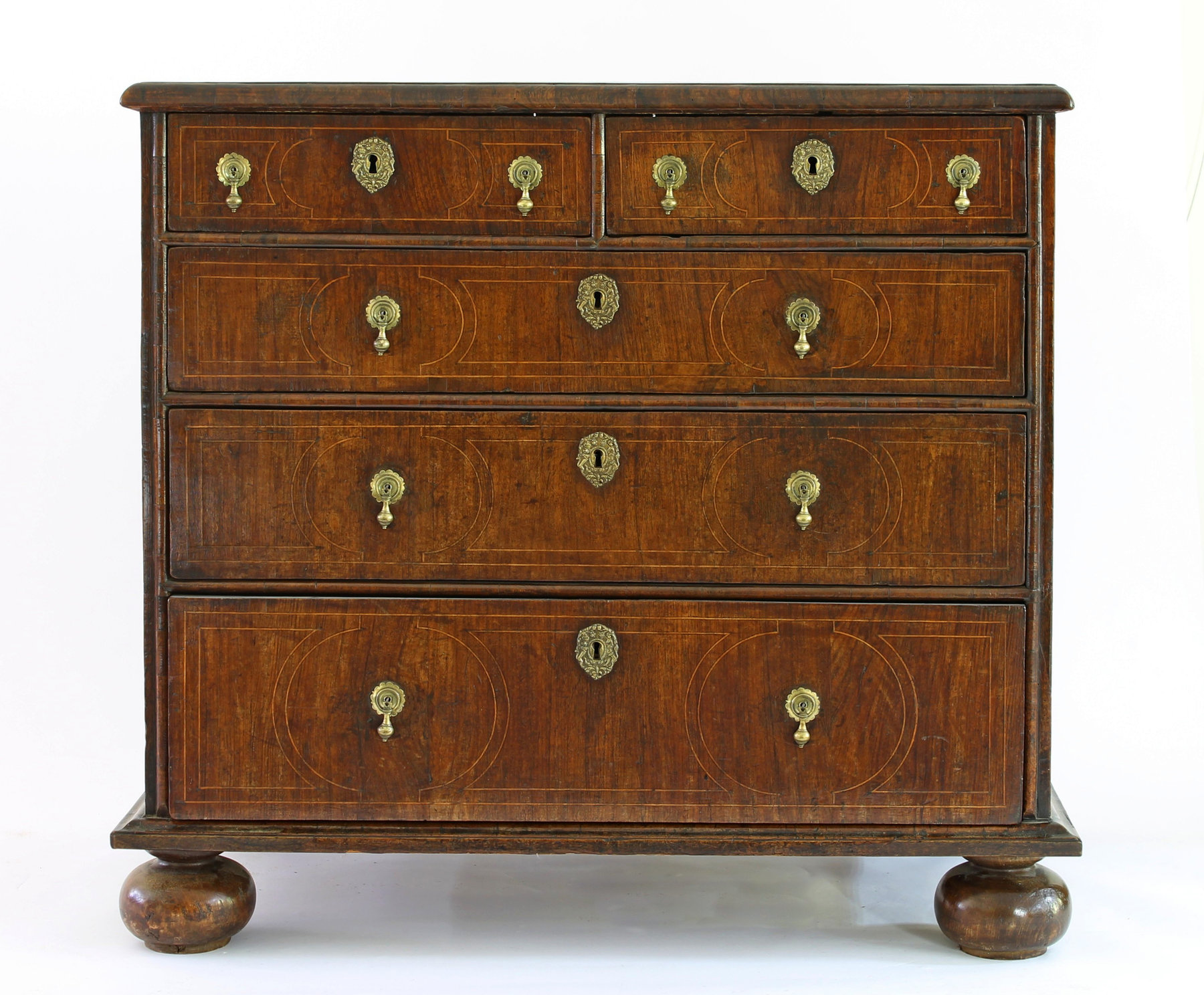 Appraisal: A William and Mary walnut chest of drawers inset with