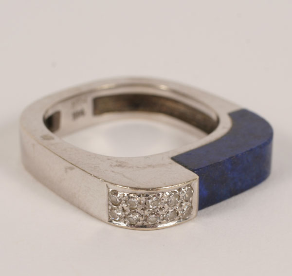 Appraisal: White Gold K modern design ring with inlaid strip of