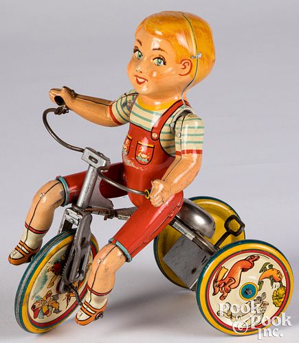 Appraisal: UNIQUE ART LITHOGRAPHED TIN WIND-UP KIDDY CYCLISTUnique Art lithographed tin