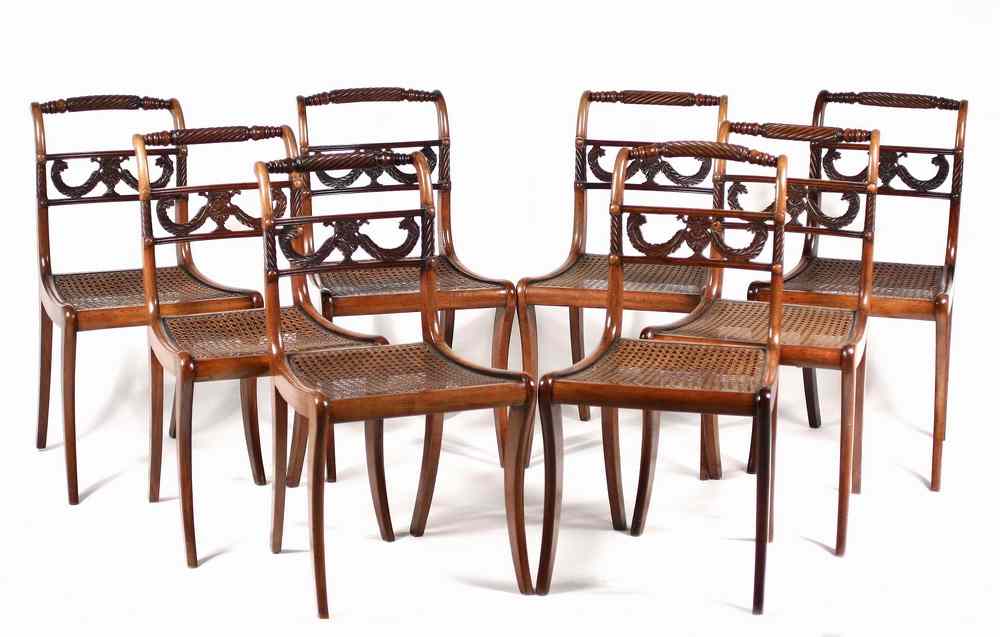 Appraisal: DINING CHAIRS - Set of fine mahogany Regency saber leg