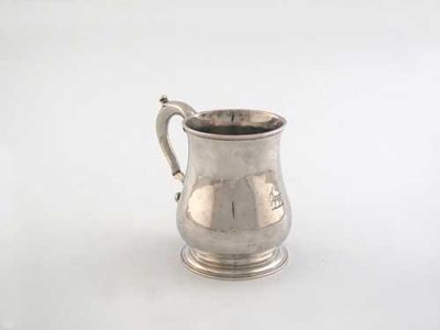 Appraisal: Channel Isles a late th century mug baluster form on