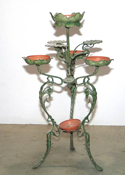 Appraisal: A Victorian style green painted floriform plant stand th century