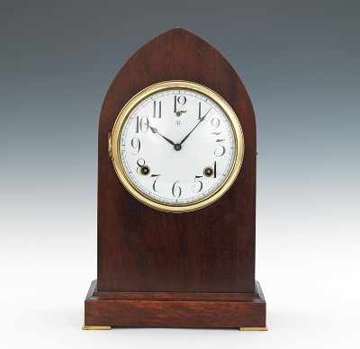 Appraisal: A Gilbert Round Gothic Day Time and Strike Shelf Clock