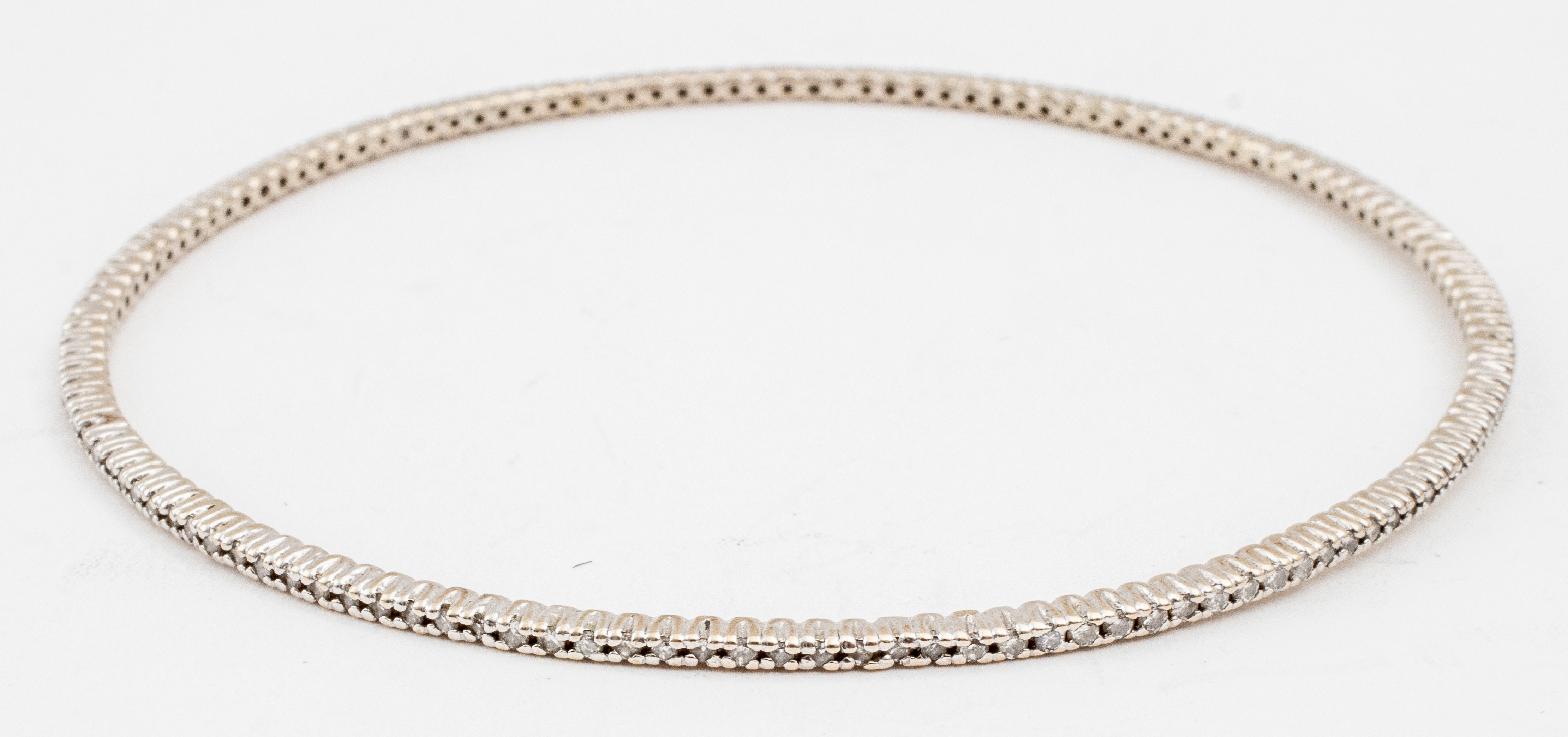 Appraisal: K WHITE GOLD DIAMOND BANGLE BRACELET K white gold diamond