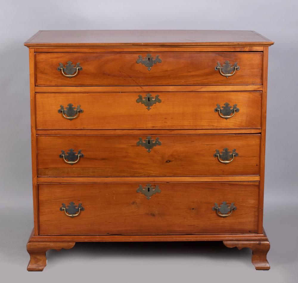 Appraisal: CHIPPENDALE CHERRY CHEST OF DRAWERS the later rectangular top above