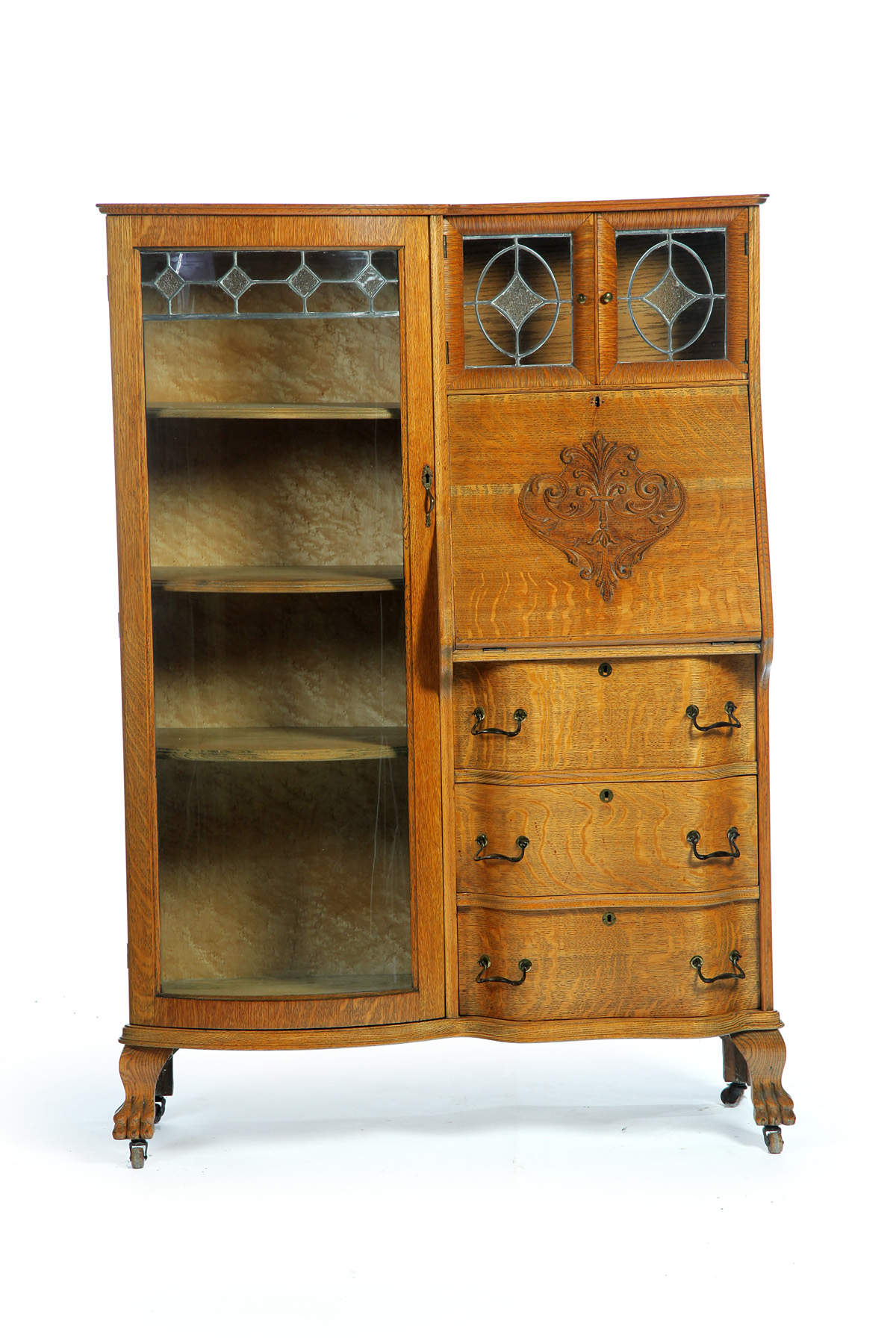 Appraisal: OAK SIDE-BY-SIDE SECRETARY BOOKCASE American ca Curved glass door and