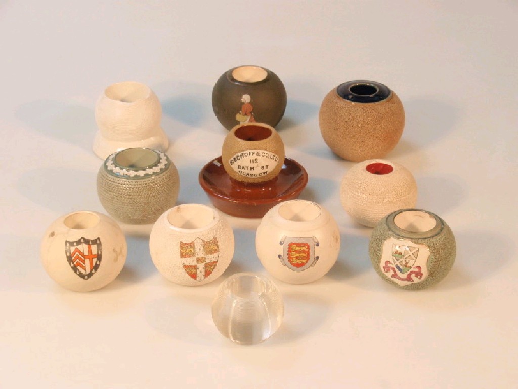 Appraisal: Eleven assorted match striker stoneware globes