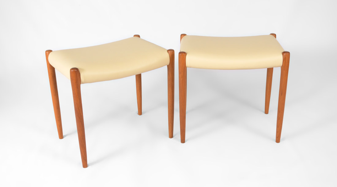 Appraisal: PAIR J L MOLLER TEAK STOOLS Teak legs ivory vinyl