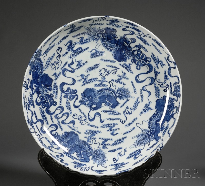 Appraisal: Large Porcelain Bowl China th century overall design of foo