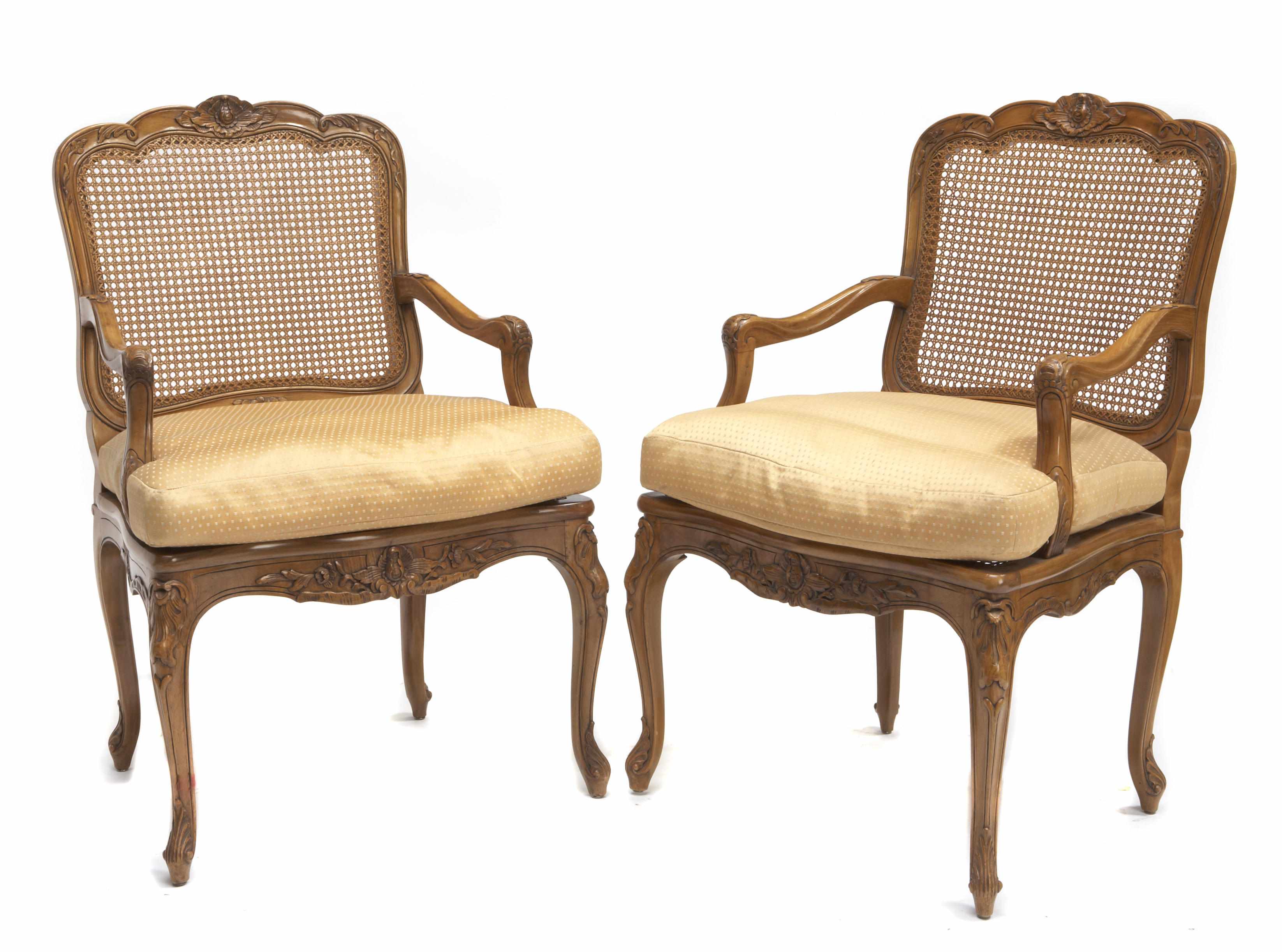 Appraisal: A pair of Louis XV style fruitwood and cane paneled