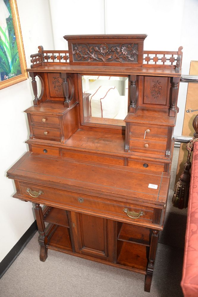 Appraisal: Walnut East Lake Victorian Desk having carved flower gallery over