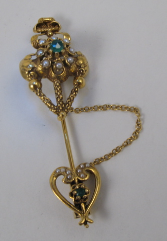 Appraisal: EMERALD AND SEED PEARL PIN k yellow gold set with