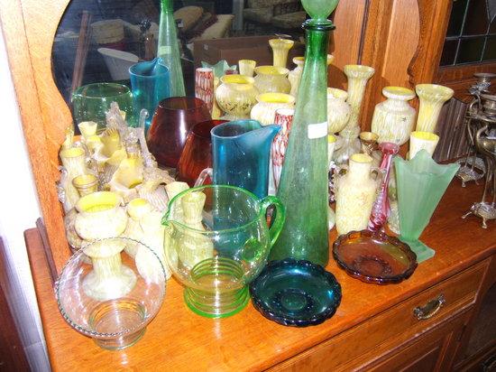 Appraisal: A quantity of coloured glass vases the largest high