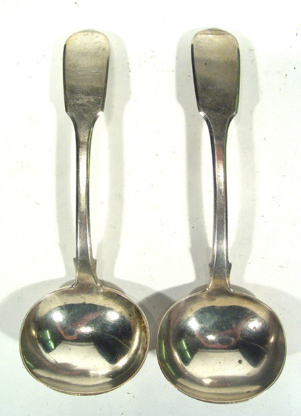 Appraisal: Pair of Victorian silver sauce ladles London