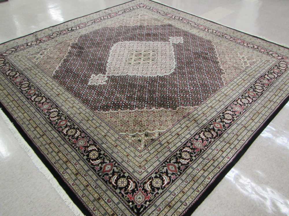 Appraisal: A SQUARE HAND KNOTTED ORIENTAL CARPET Persian Bijar design central