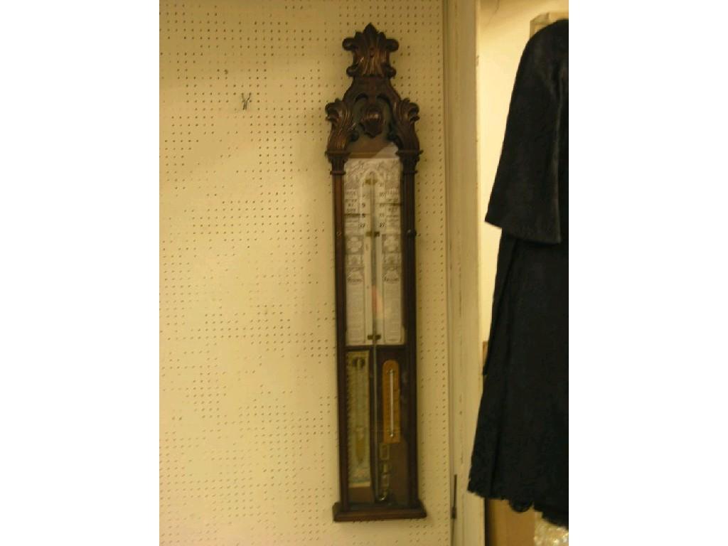 Appraisal: An Admiral Fitzroy barometer with printed paper register plate within