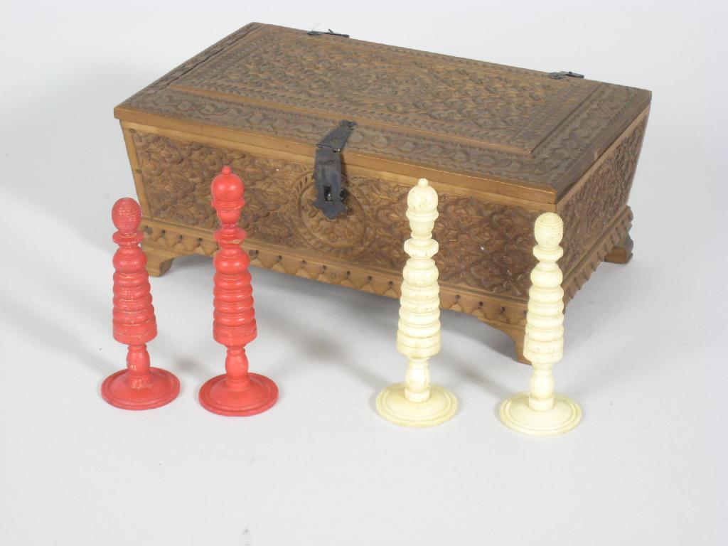 Appraisal: An Indian carved red and cream ivory Chess Set contained