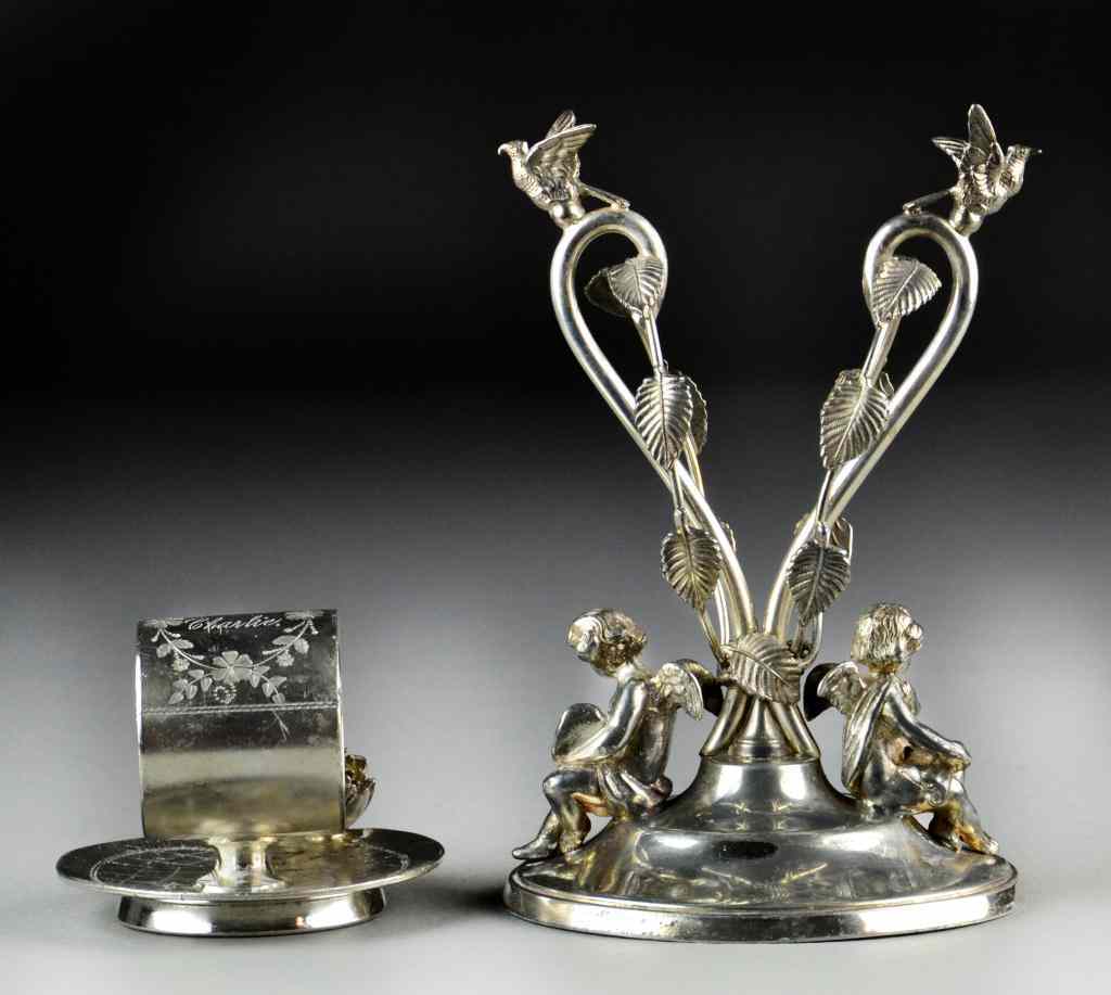 Appraisal: American Figural Silver Plate Napkin HoldersTo include a large example