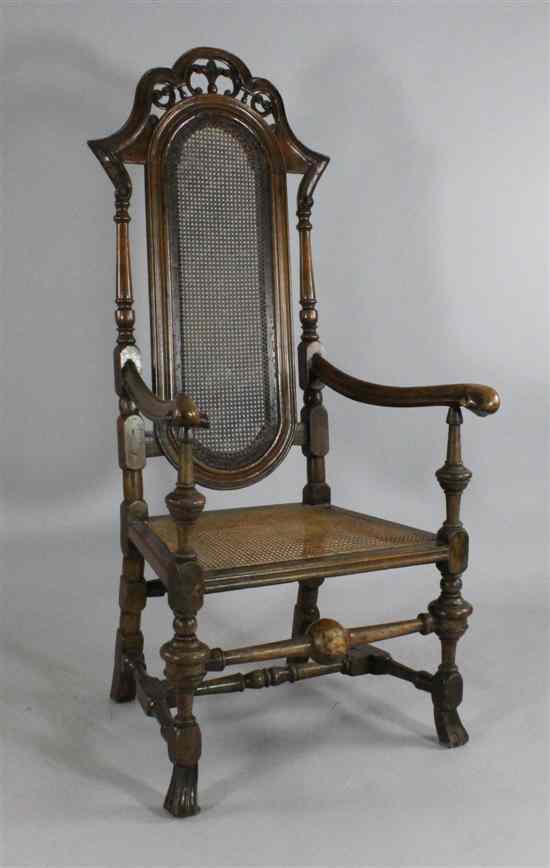 Appraisal: A William and Mary walnut chair with caned back and