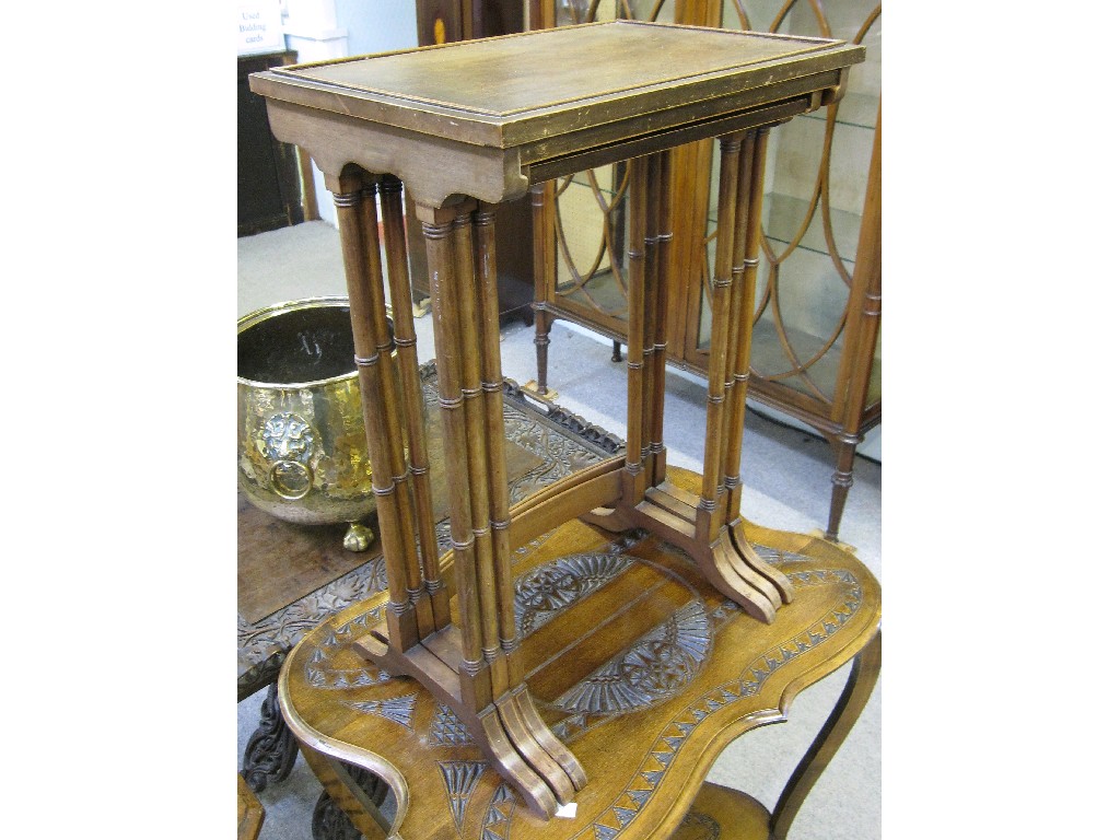 Appraisal: Edwardian mahogany nest of three tables in the Regency style