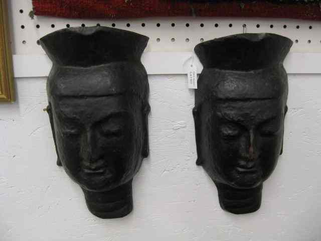 Appraisal: Pair of Cast Iron Figural Buddha Head Plaques '' x