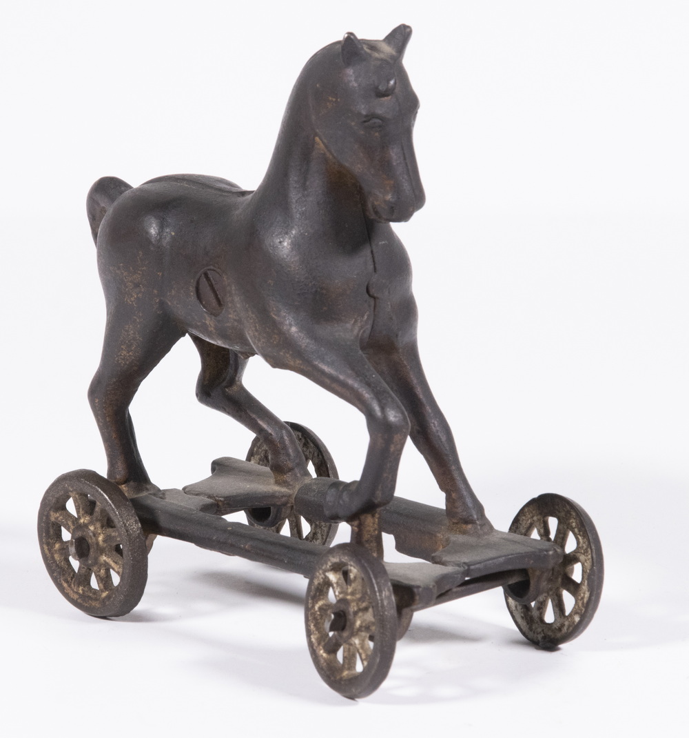 Appraisal: IRON PRANCING HORSE ON WHEELS BANK Early th c Cast