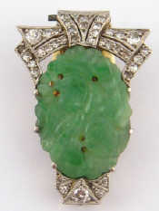 Appraisal: An carat gold Art Deco carved Jade and diamond clip