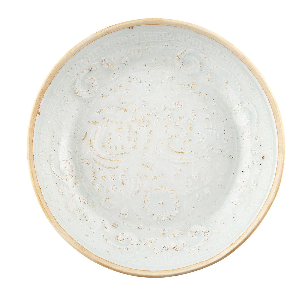 Appraisal: QINGBAI GLAZED DISH POSSIBLY SONG DYNASTY the interior well moulded