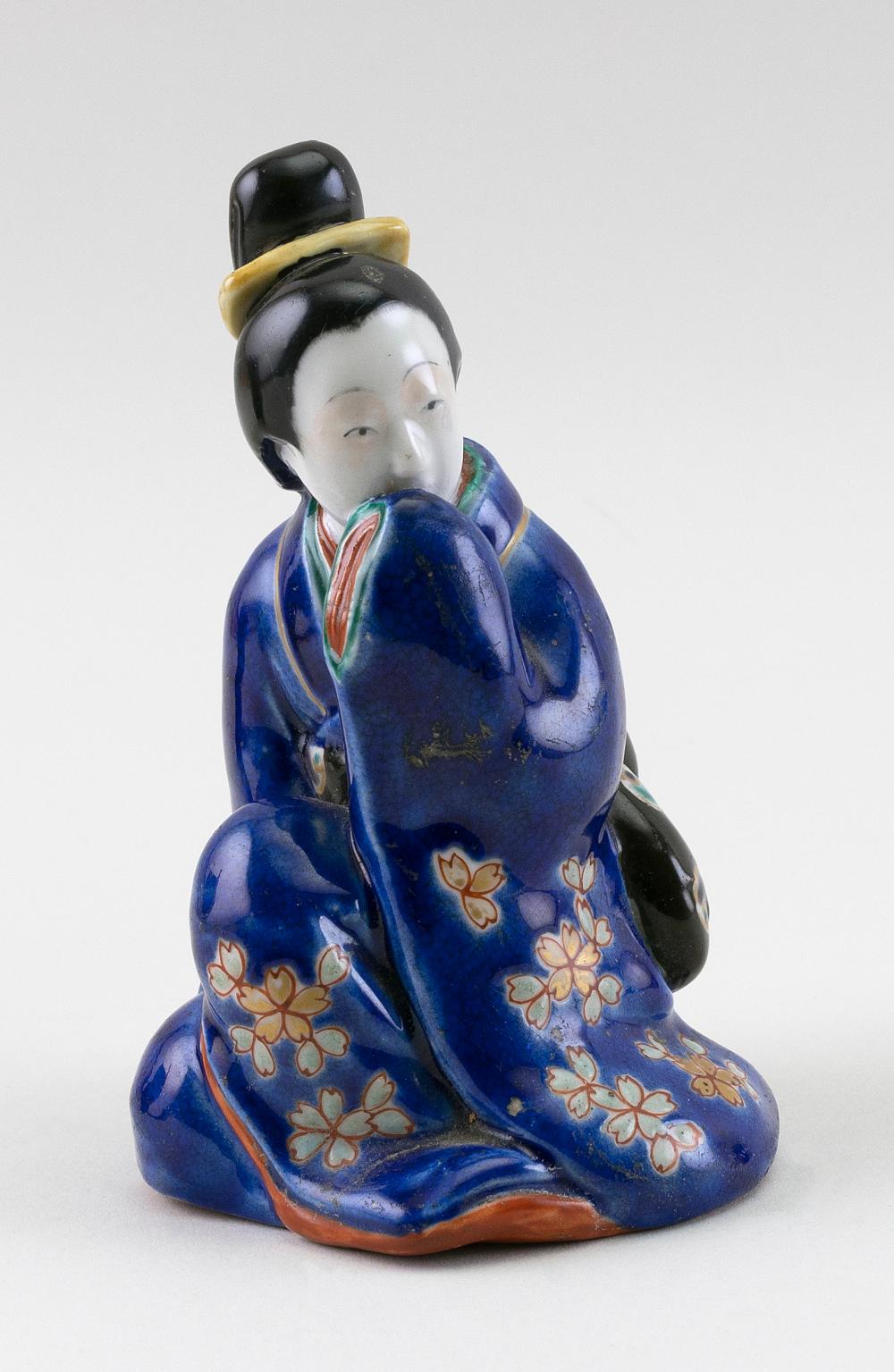 Appraisal: JAPANESE PORCELAIN EROTIC FIGURE OF A SEATED BIJIN MEIJI PERIOD