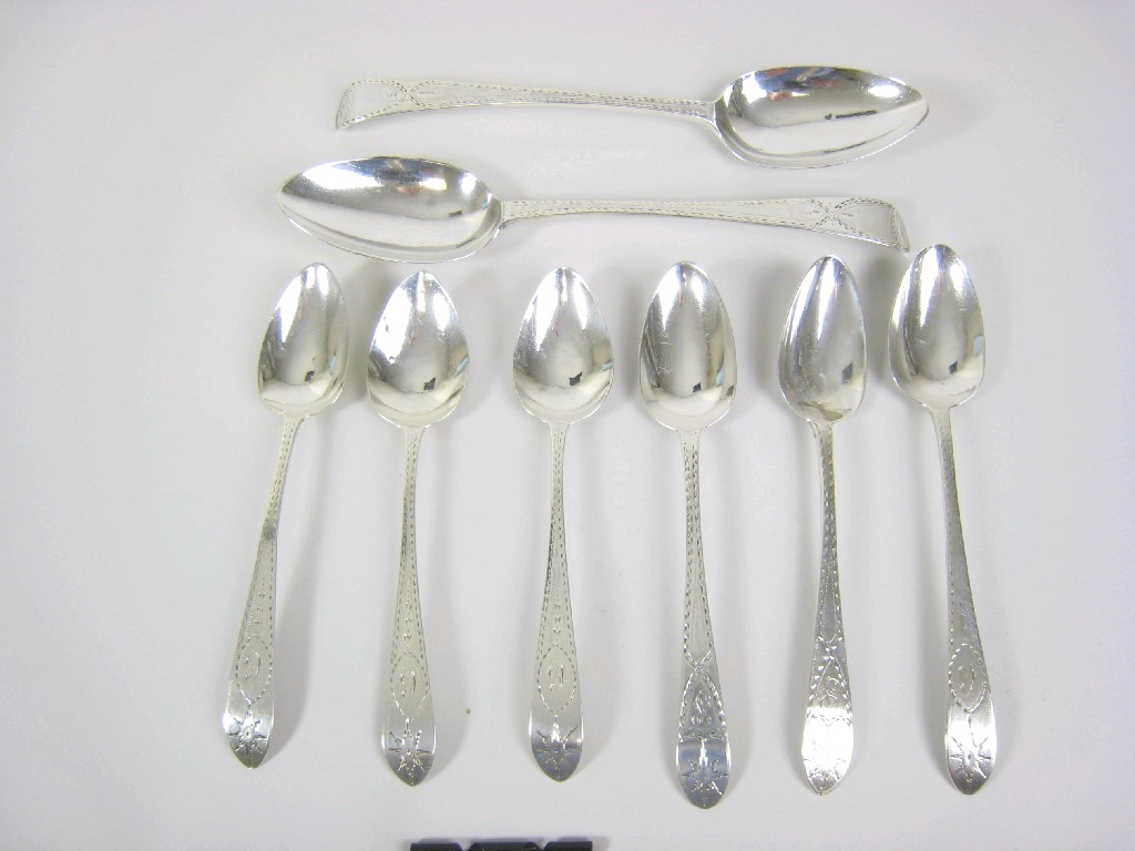 Appraisal: Pair of George III Table Spoons old english pattern with