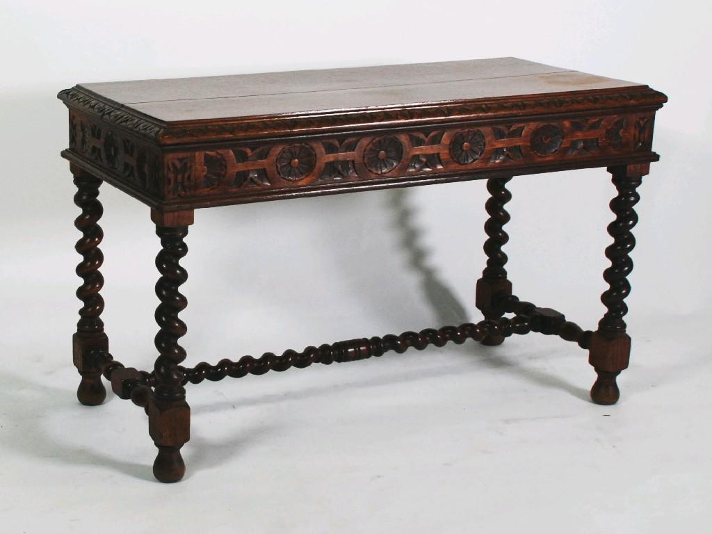 Appraisal: LATE NINETEENTH CENTURY CARVED OAK CENTRE TABLE the oblong top