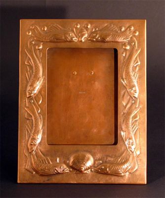 Appraisal: A Newlyn copper picture frame easel back hammered in relief