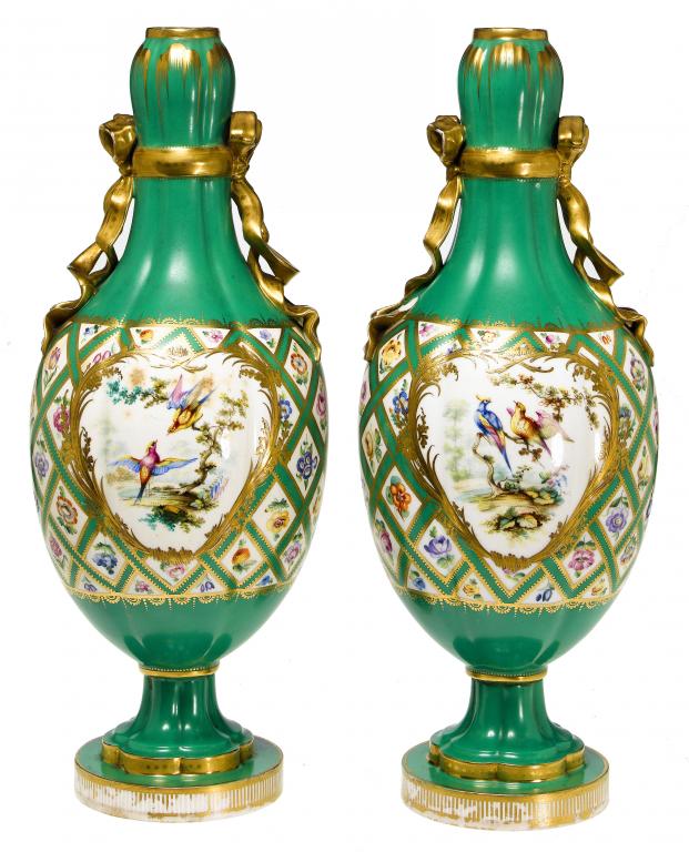 Appraisal: A PAIR OF MINTON HAREWOOD VASES painted in S vres