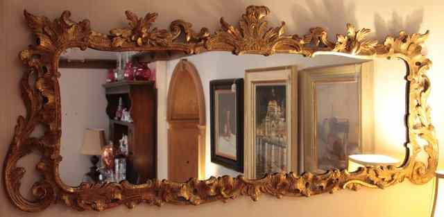 Appraisal: A GEORGE III GILT CARVED WOOD RECTANGULAR OVERMANTLE MIRROR with