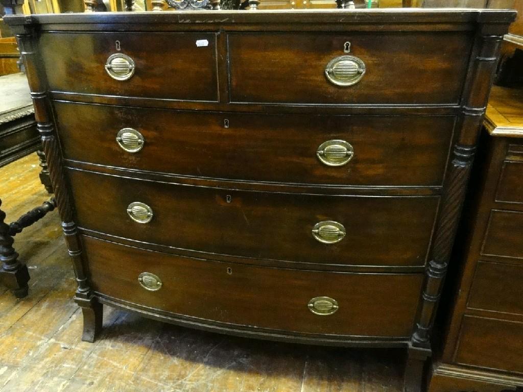 Appraisal: An early th century mahogany bow fronted chest fitted with