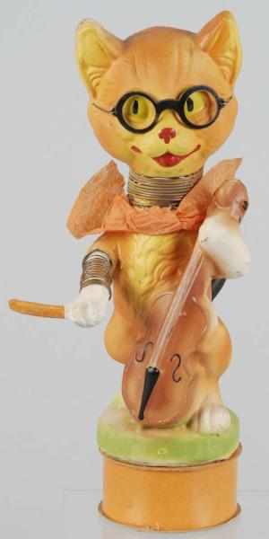 Appraisal: Composition Orange Cat Candy Container Nodder Description Musical playing violin