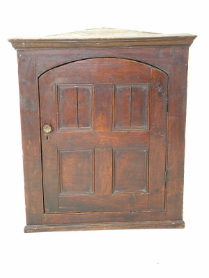 Appraisal: An oak corner cabinet early th century the moulded cornice