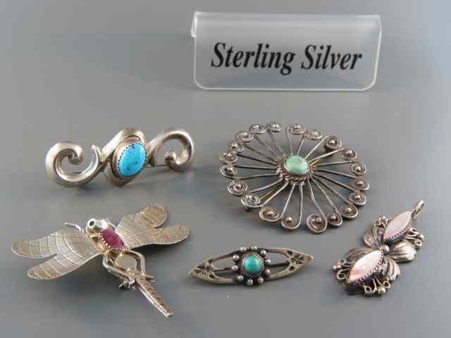 Appraisal: Indian Sterling Silver Items brooches pendant various stones including turquoise