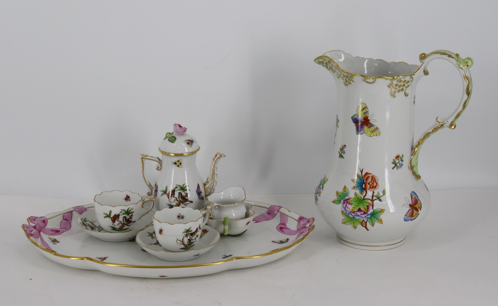 Appraisal: HEREND PORCELAIN GROUPING To Include tea cups and saucers teapot