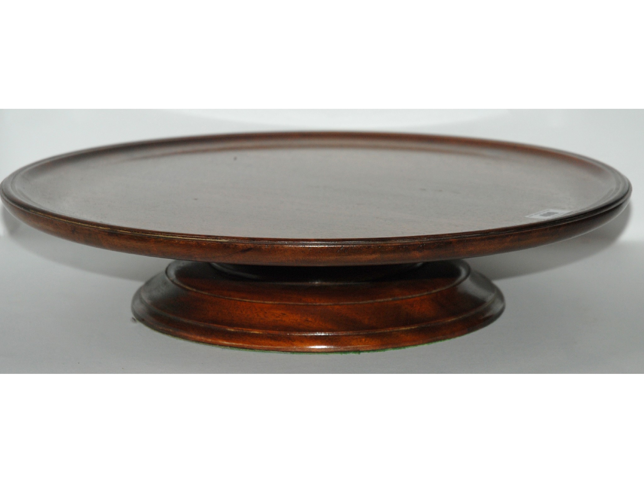 Appraisal: A mahogany circular lazy Susan and a mahogany inlaid knife