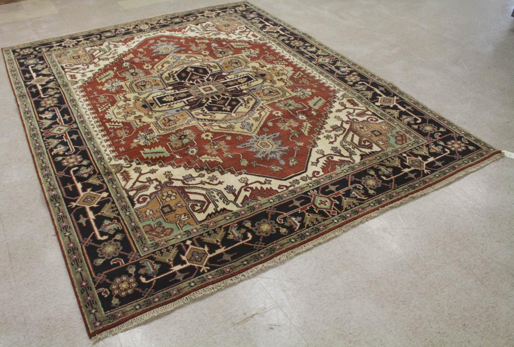 Appraisal: HAND KNOTTED ORIENTAL CARPET Persian Serapi or Heriz design on