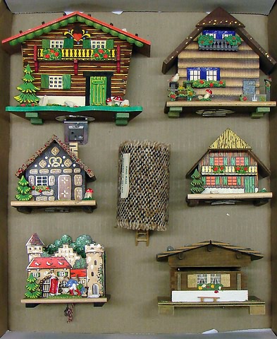 Appraisal: Lot German wooden banks in the shape of a castle