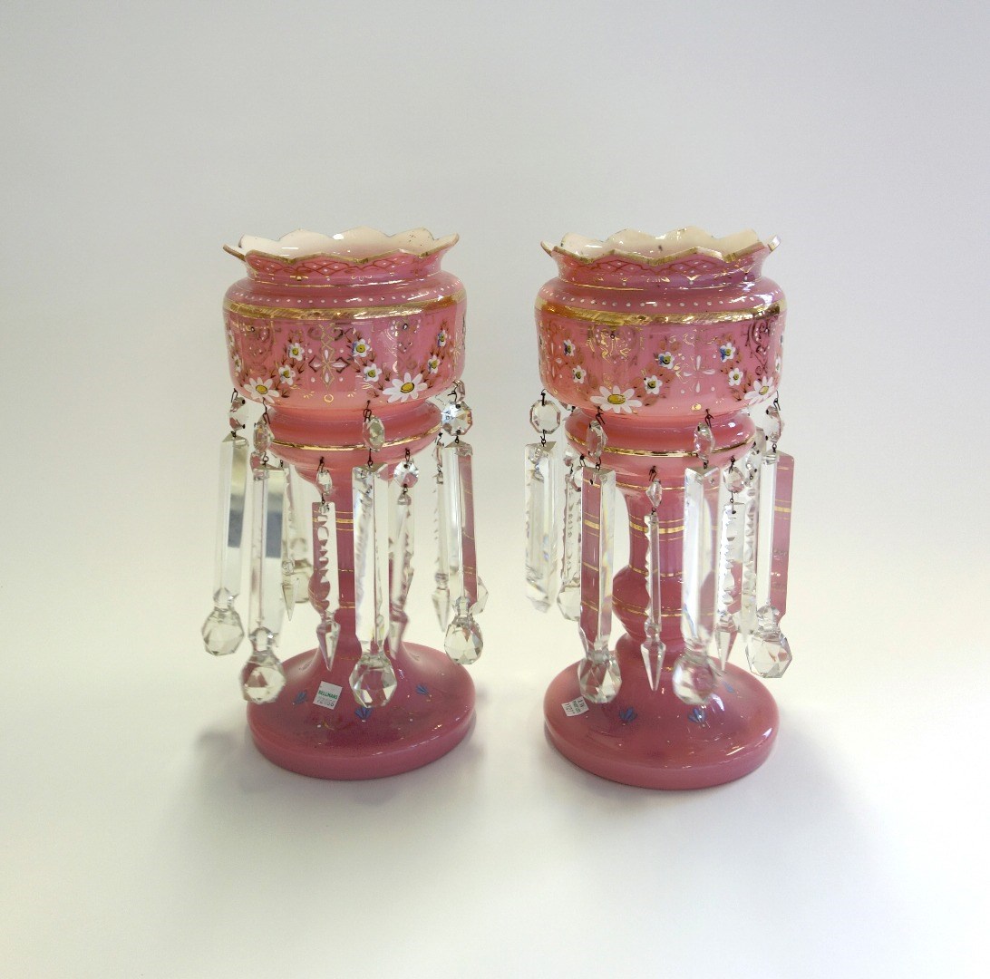 Appraisal: A pair of Victorian pink glass lustres gilt foliate decorated