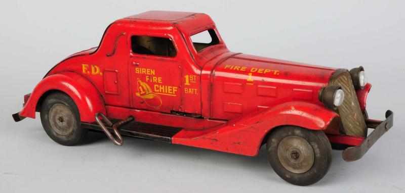 Appraisal: Pressed Steel Marx Siren Fire Chief Car Toy American Wind-up