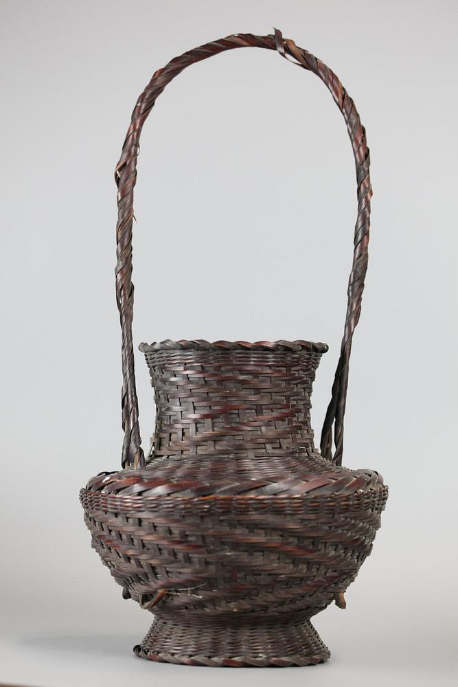 Appraisal: Japanese woven bamboo basket possibly th c in H x