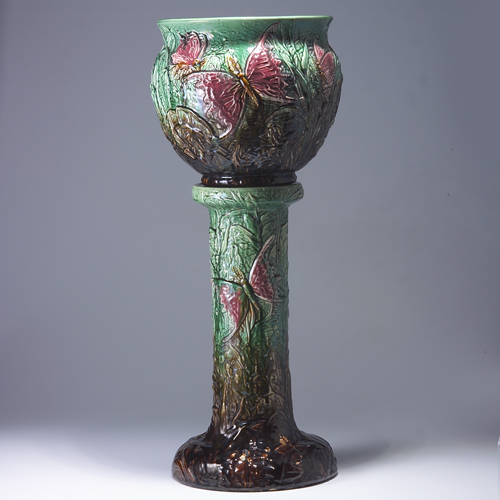 Appraisal: ROSEVILLE Majolica-type jardiniere and pedestal set embossed with pink butterflies