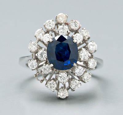 Appraisal: Lady's sapphire and diamond ring one oval faceted intense blue