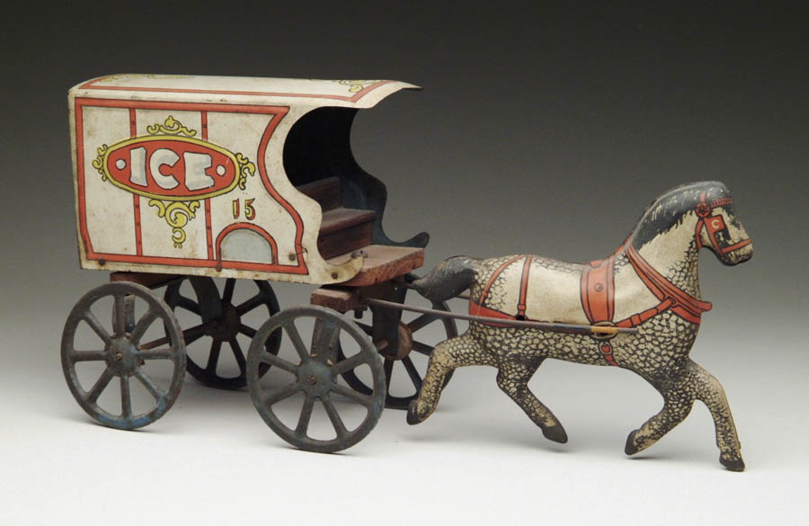 Appraisal: LITHOGRAPHED HORSE DRAWN ICE WAGON Wagon is lithographed in cr