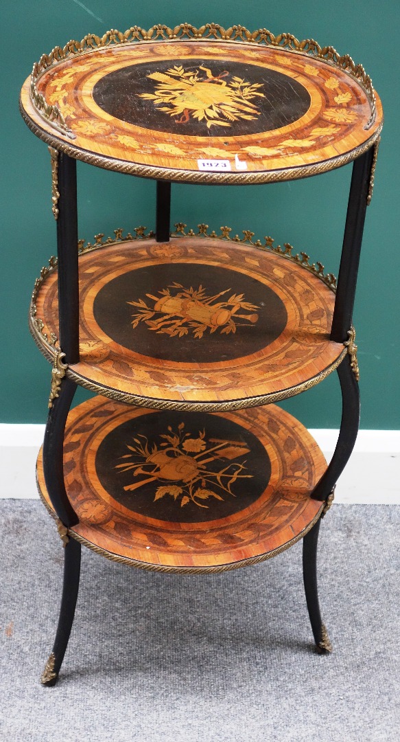 Appraisal: A late th century French gilt metal mounted marquetry inlaid