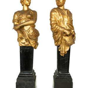 Appraisal: A Pair of Monumental Gilt Metal Figures on Marble Pedestals